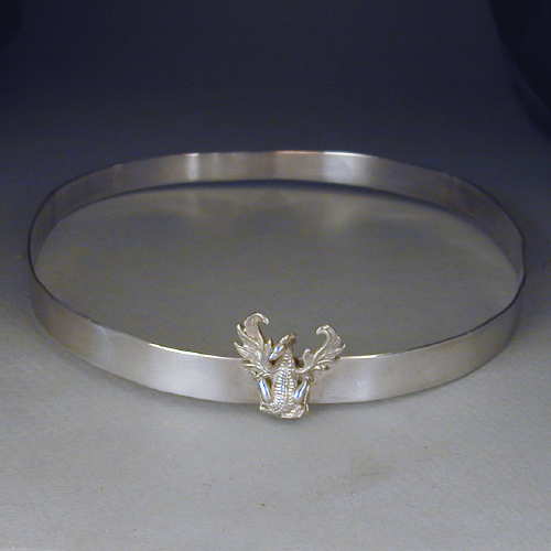 Sterling silver half-inch high circlet crown. Adorned with a Dragon.