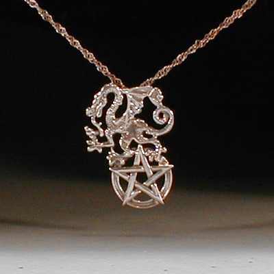 Sterling silver dragon and pentagram pendant.