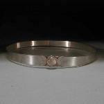 This is a similar design to our Triple Moon Crown. Instead of a full band of silver we use a twelve inch band with leather cords to connect the ends. Not only does this reduce the cost of the crown, but it also allows one crown to fit multiple people.