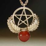The pentagram has long been associated with protection in many cultures. The knights of the crusades had the star placed on their shields as a protective talisman. Where the symbol of the cross represented the Christs suffering the pentacle represented his protection. This Sterling silver piece is set with a 12mm round carnelian, a popular stone from ancient Egypt through the middle ages, and the Renaissance. This stone is associated with protection and courage.